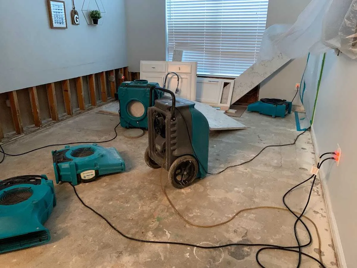 Dehumidifier in flood-cut room for Water Damage Restoration in McLean
